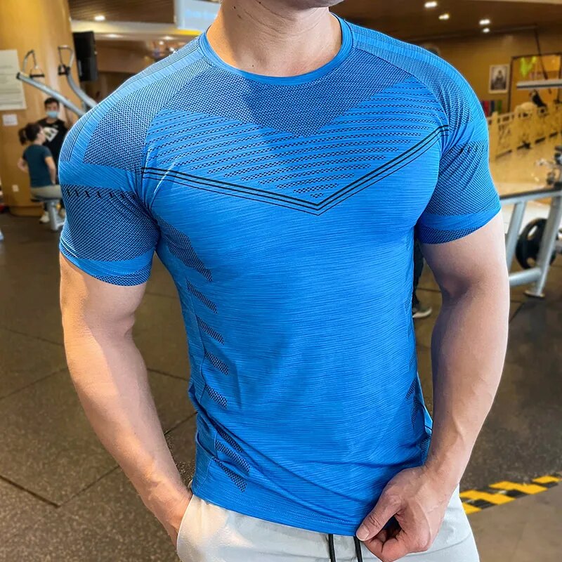 https://www.gentlemenshapewear.com/wp-content/uploads/2023/10/Summer-compression-Breathable-Short-Sleeve-Men-Running-Fitness-Tshirt-elastic-Quick-Dry-Sports-Bodybuilding-Training-Shirts.jpg